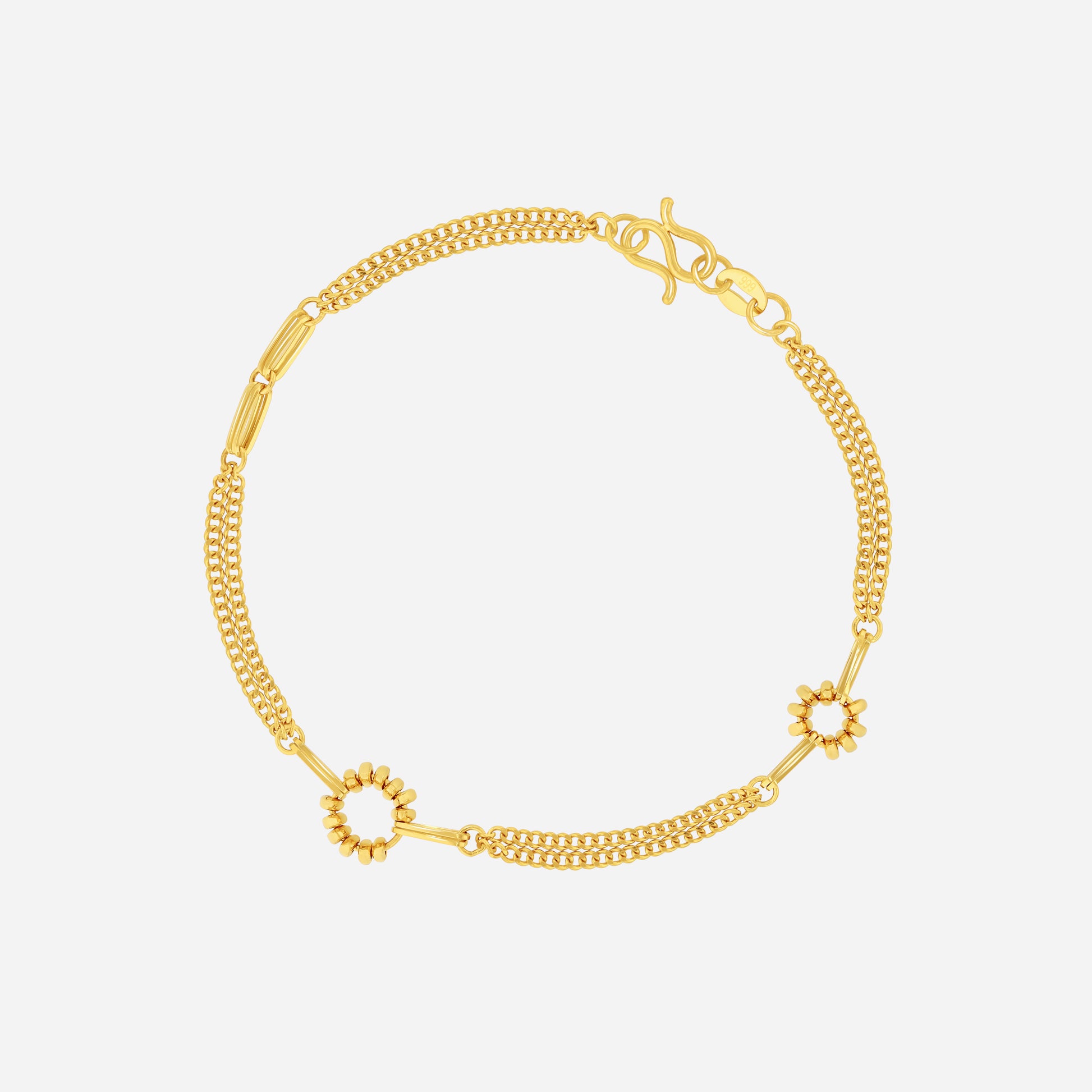Curve link bracelet in 22K yellow gold with smooth rounded links and circular floral accents.