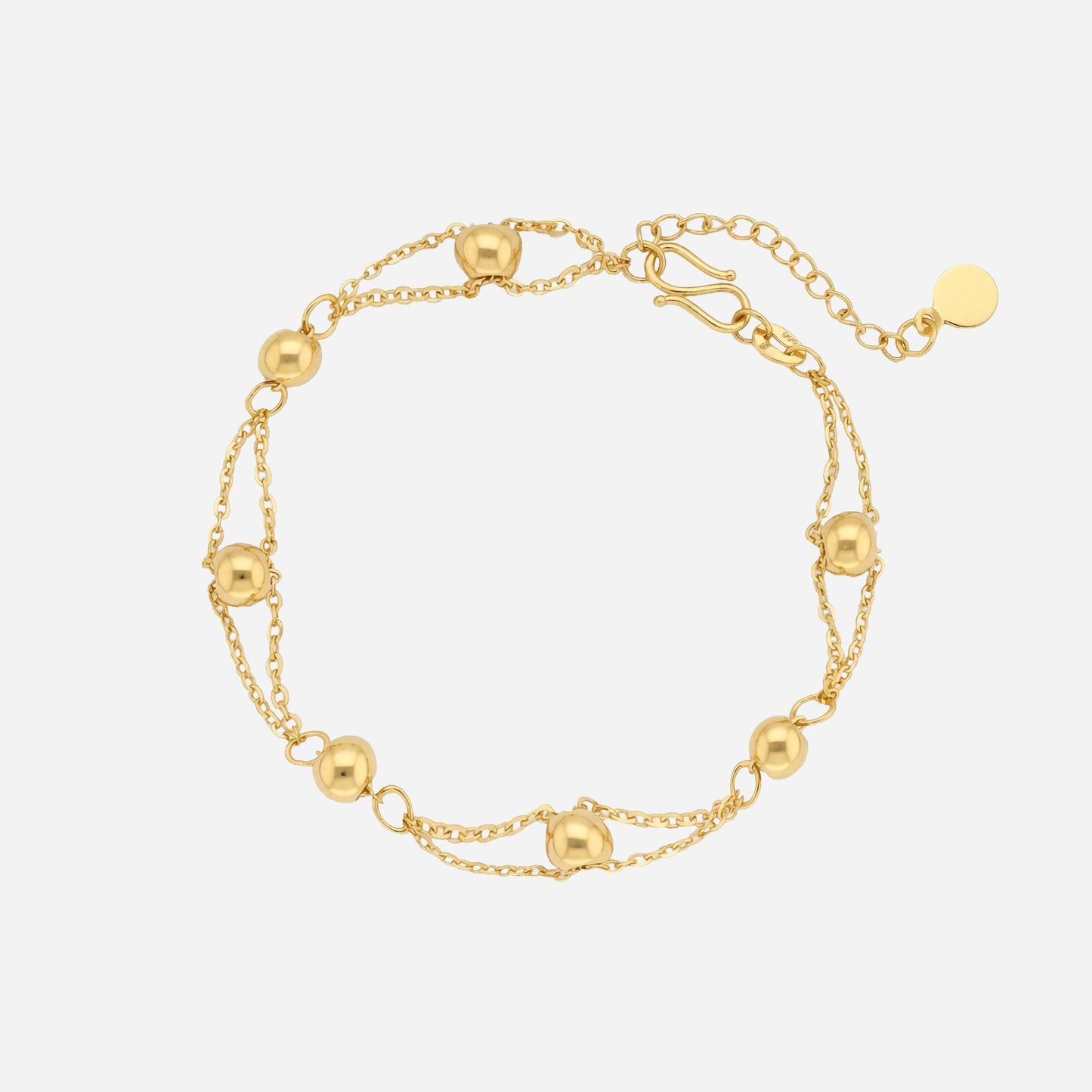 24k yellow gold beaded bracelet on a triple-strand chain, featuring delicate gold beads and a secure clasp.