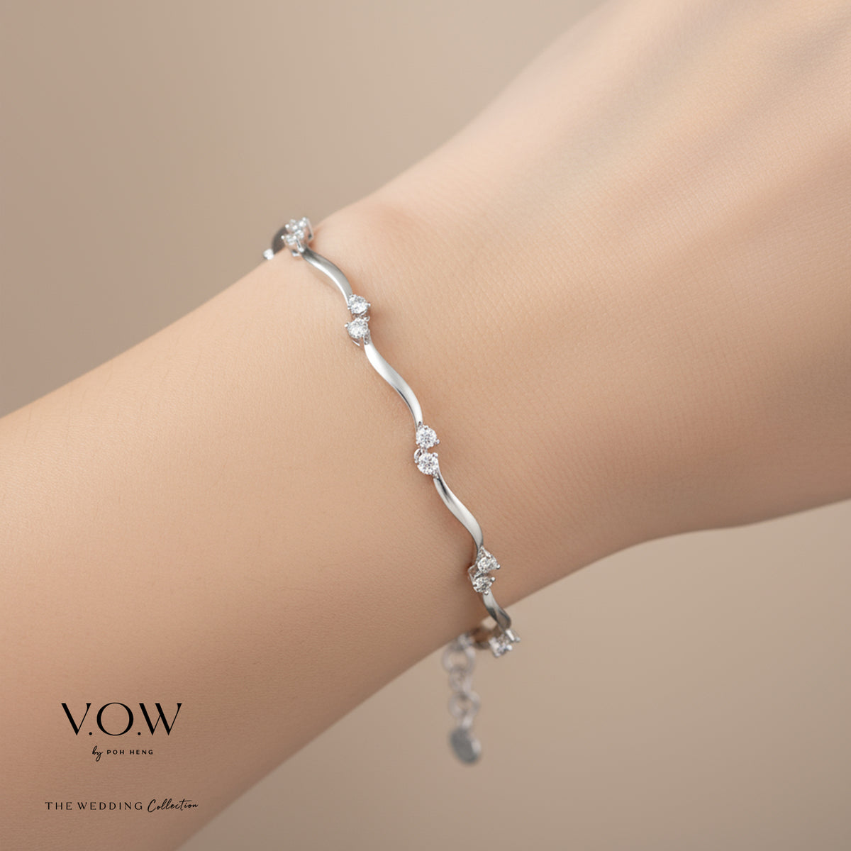 Caressing Waves Diamond Bracelet in 18K white gold with diamonds set in a wavy design, featuring a delicate chain.