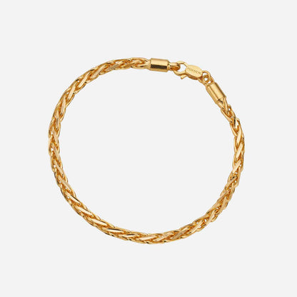 Wheat bracelet in 22K yellow gold, intricately woven design with a secure clasp detail. Classic and timeless jewelry piece.