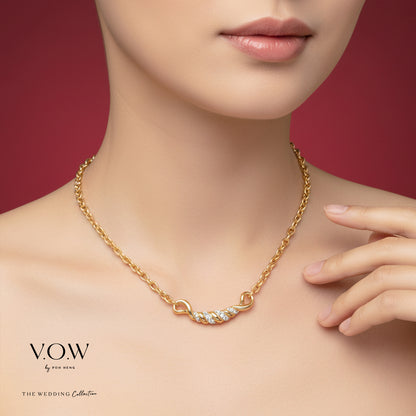 22K yellow gold necklace featuring an infinity symbol design with delicate diamond-like accents. Elegant wedding jewelry piece.