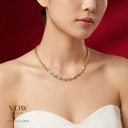 Perpetual Affection necklace in yellow and white gold with a bold, linked design showcasing elegant gemstone accents.