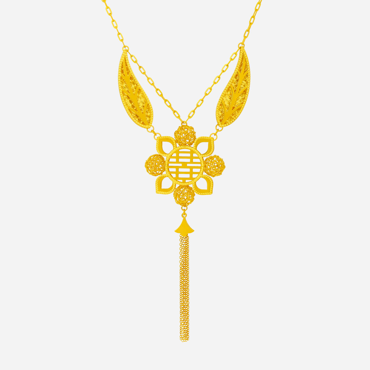 Bloom in Happiness Necklace in yellow gold features a Double Happiness emblem with filigree petals and cascading tassels.