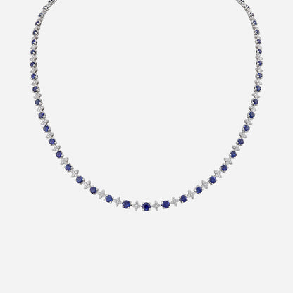 Opulent blue sapphire and diamond necklace in 18K white gold with a stunning elegant design.