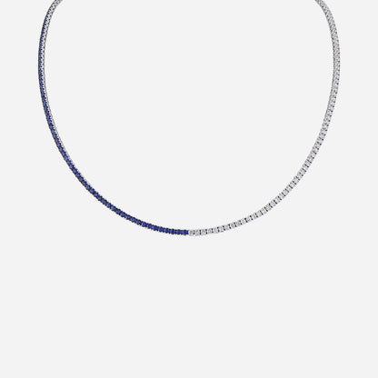 Blue sapphire and diamond necklace in 18K white gold with a half-and-half design showcasing vibrant sapphires and brilliant diamonds.