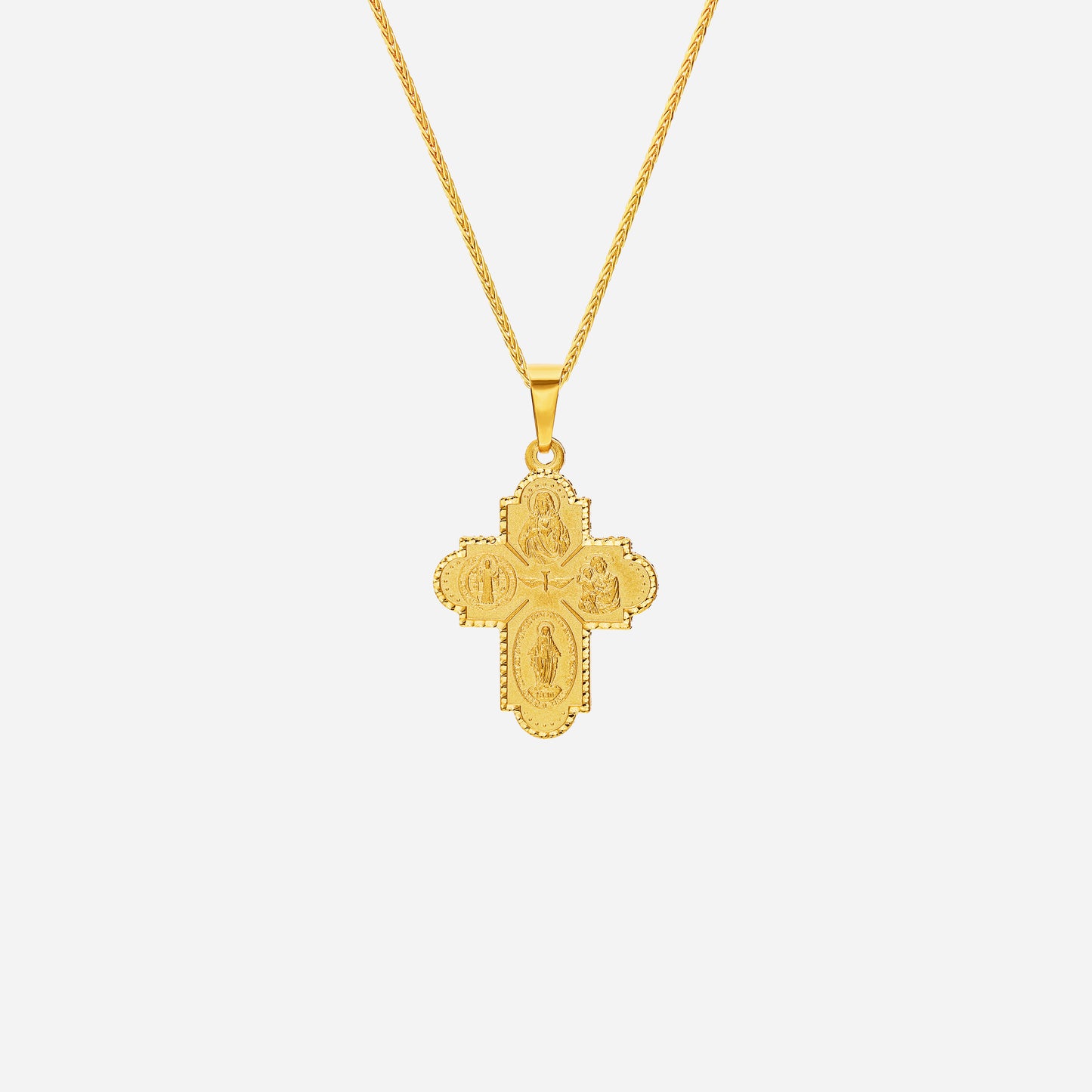 four way cross pendant in 22k yellow gold with intricate religious designs and a central dove of peace.