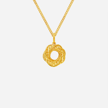 Aura Petal Pendant in textured 22K yellow gold with a unique petal design and open center. Perfect for elegant styling.
