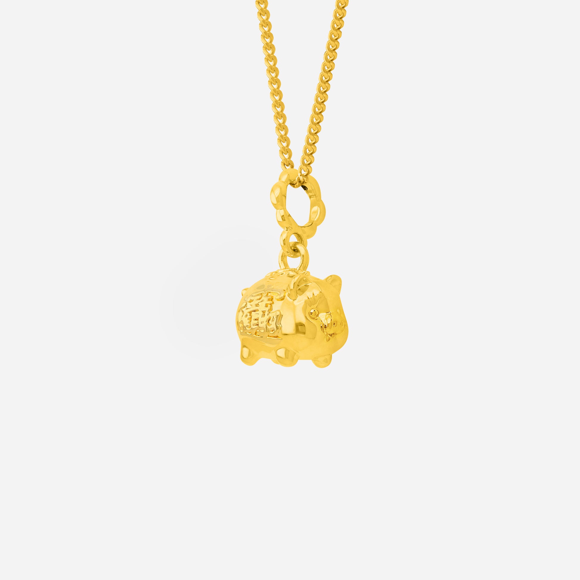 Wealth Pig Pendant in 22K yellow gold featuring a finely sculpted pig motif with intricate detailing.