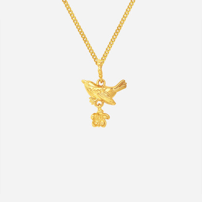Blooming Bird Pendant in 22K yellow gold featuring a bird and delicate flower design. Elegant and whimsical style.