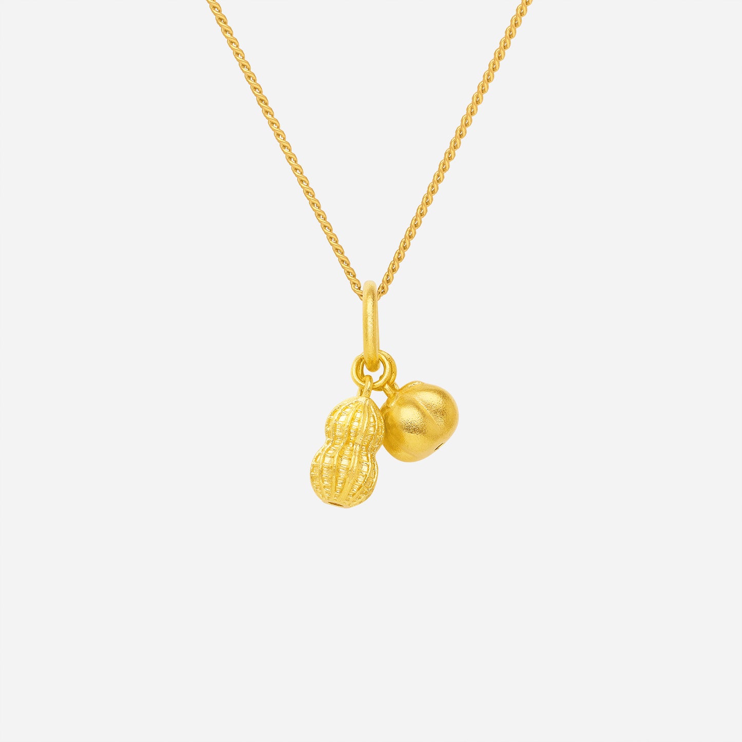 good fortune pendant in 22k yellow gold with peanut and persimmon charms symbolizing abundance and fortune.