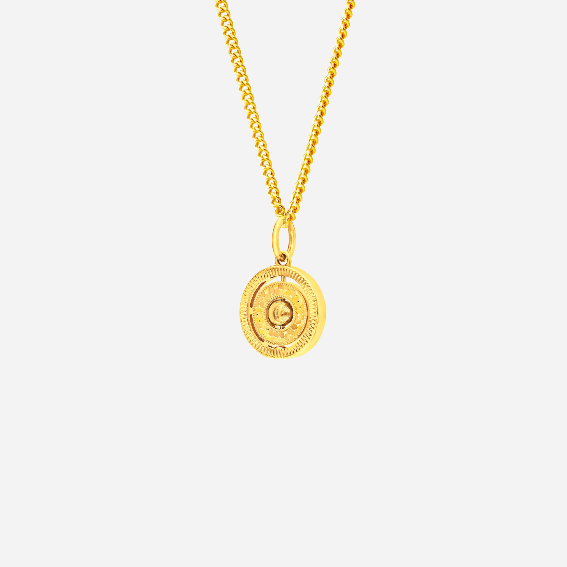 Lucky Circle Pendant in 22K yellow gold with intricate detailing and textured circular design. Chain not included.