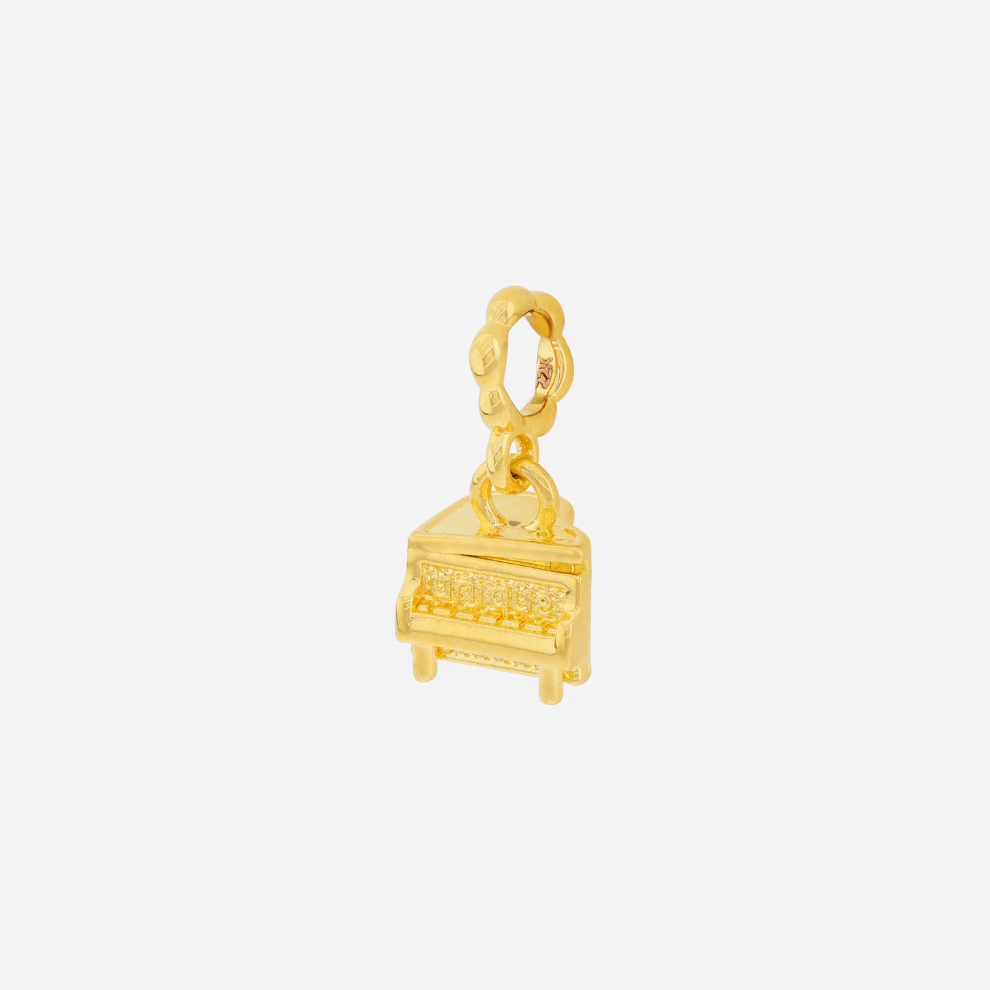 piano charm in 22k yellow gold with intricate detailing, perfect for music lovers and stylish accessories.