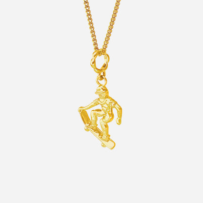 Ace of Skateboarding Pendant in 22K yellow gold featuring a sculpted skateboarder in motion. Chain sold separately.