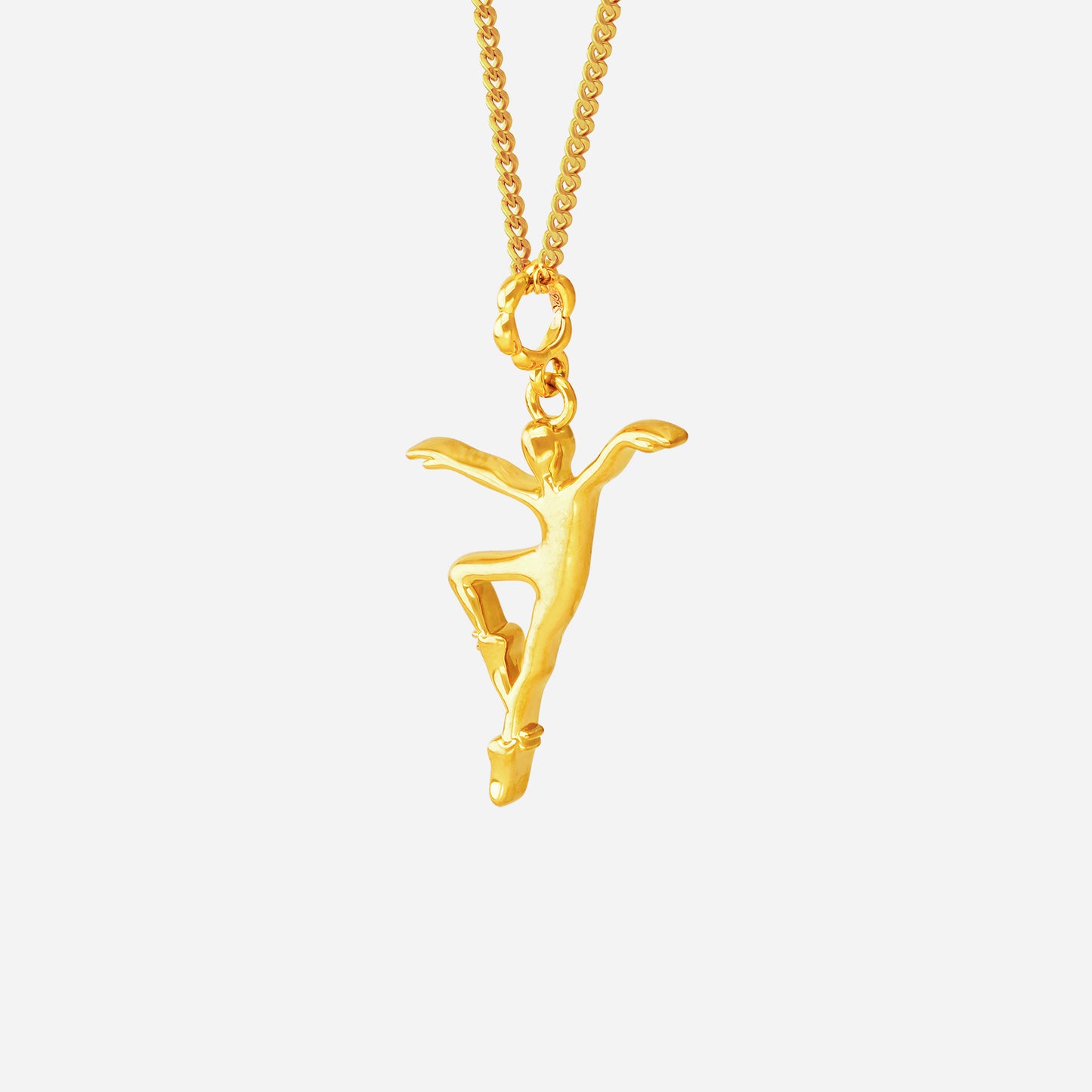ballet-inspired ace of ballerina pendant in 22k yellow gold, featuring a delicately sculpted dancer in motion.