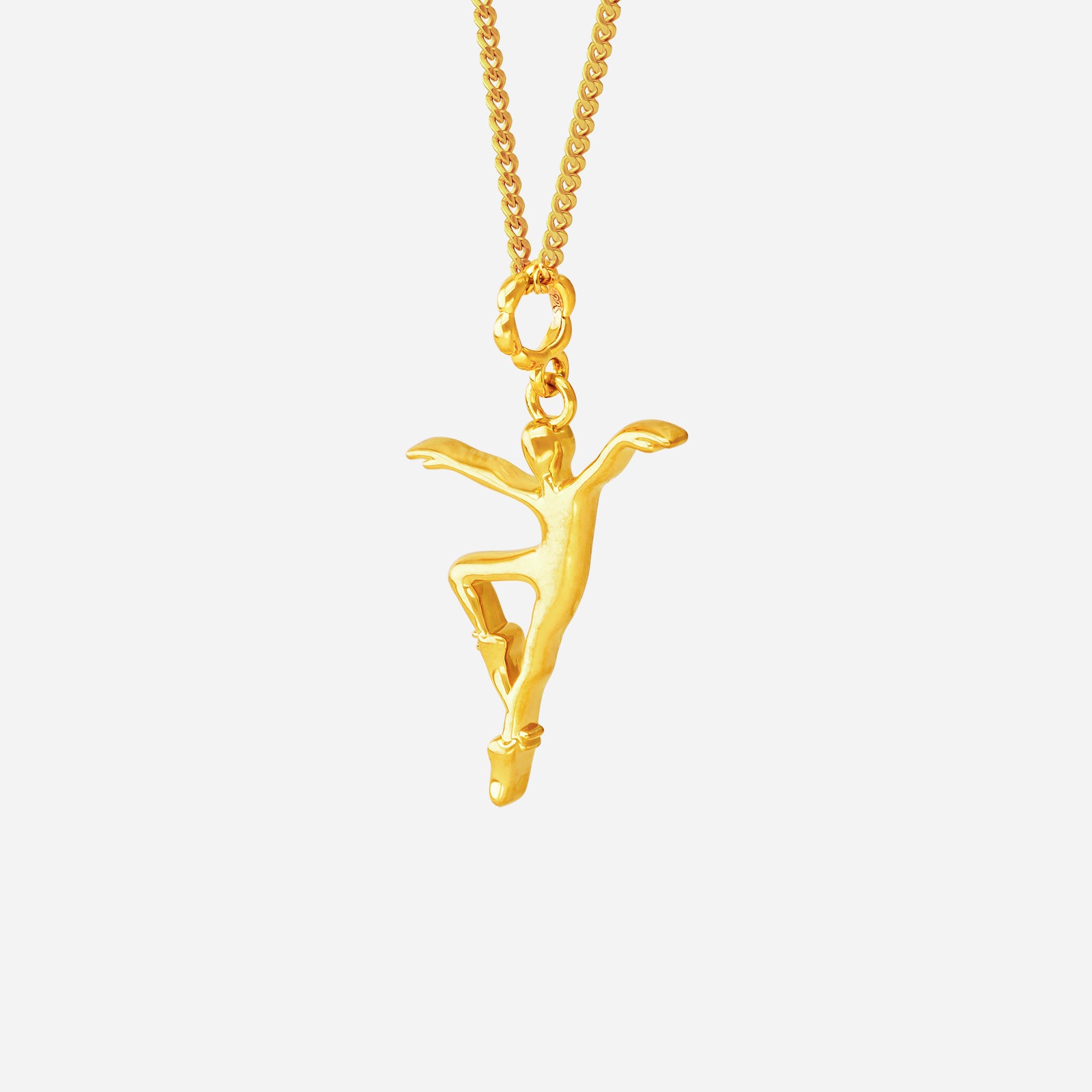Ballet-inspired Ace of Ballerina pendant in 22K yellow gold, featuring a delicately sculpted dancer in motion.