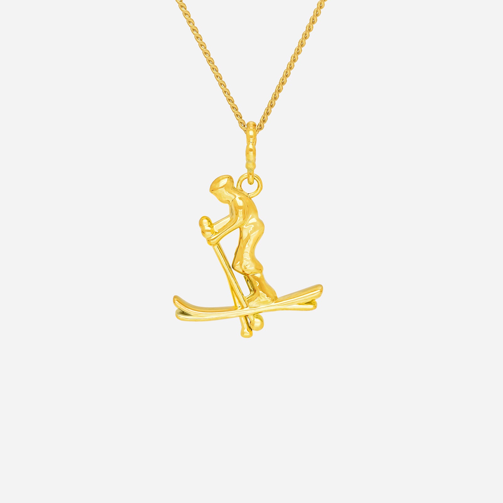 Ace of Skiing Pendant in yellow gold featuring a skier in motion, perfect for sports enthusiasts and adventurers.