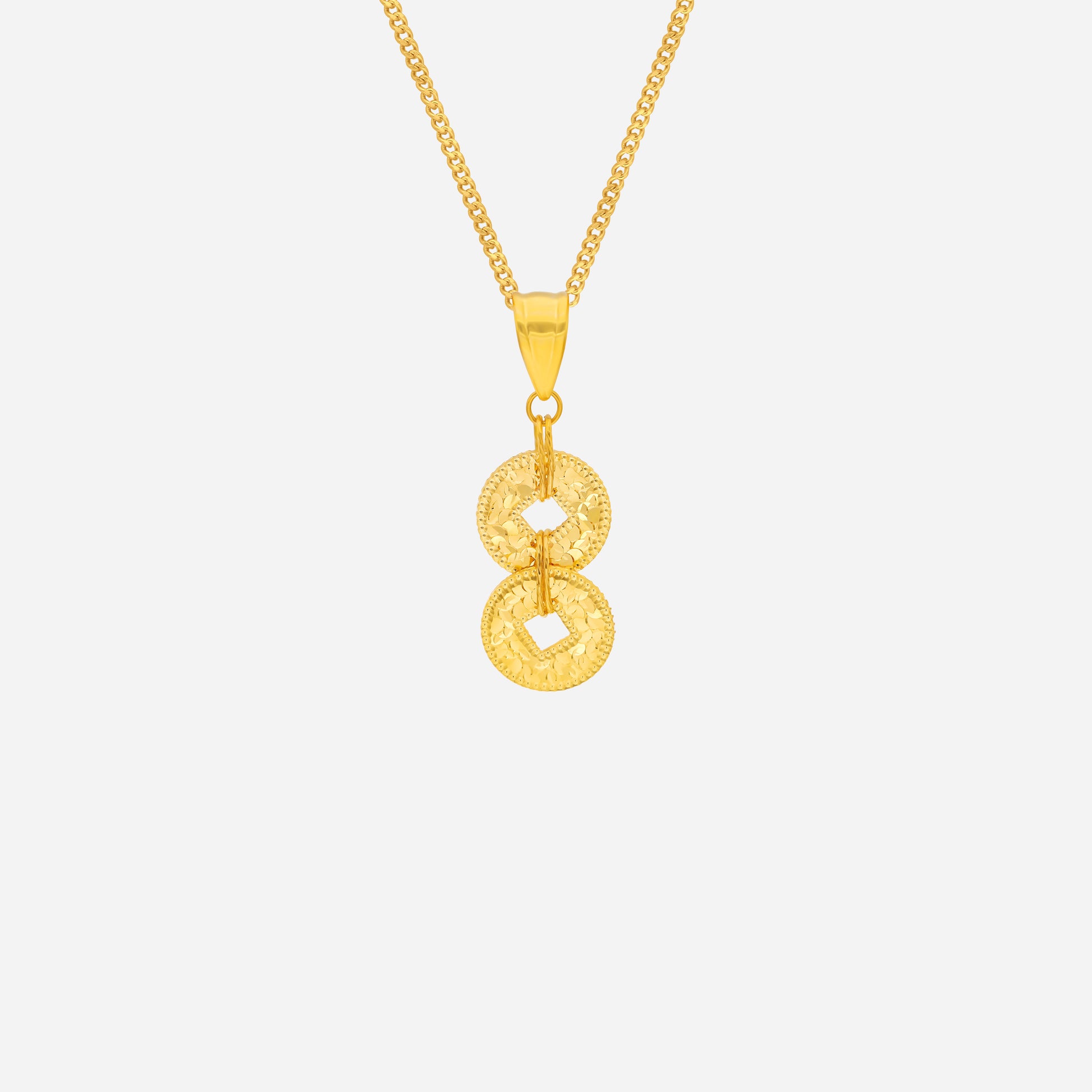 Yellow gold Coin of Wealth pendant featuring dual textured circles and a square cutout design. Perfect for elegant styling.