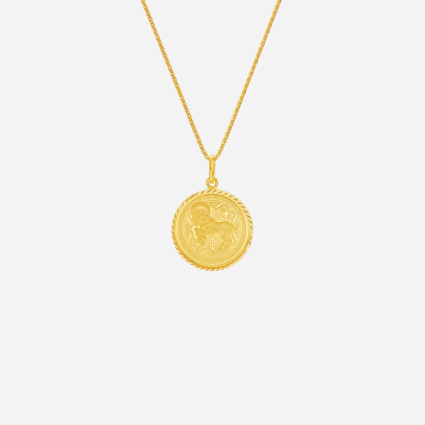 prosperity goat pendant in 22k yellow gold with a detailed goat design and rope-edge finish. chain not included.
