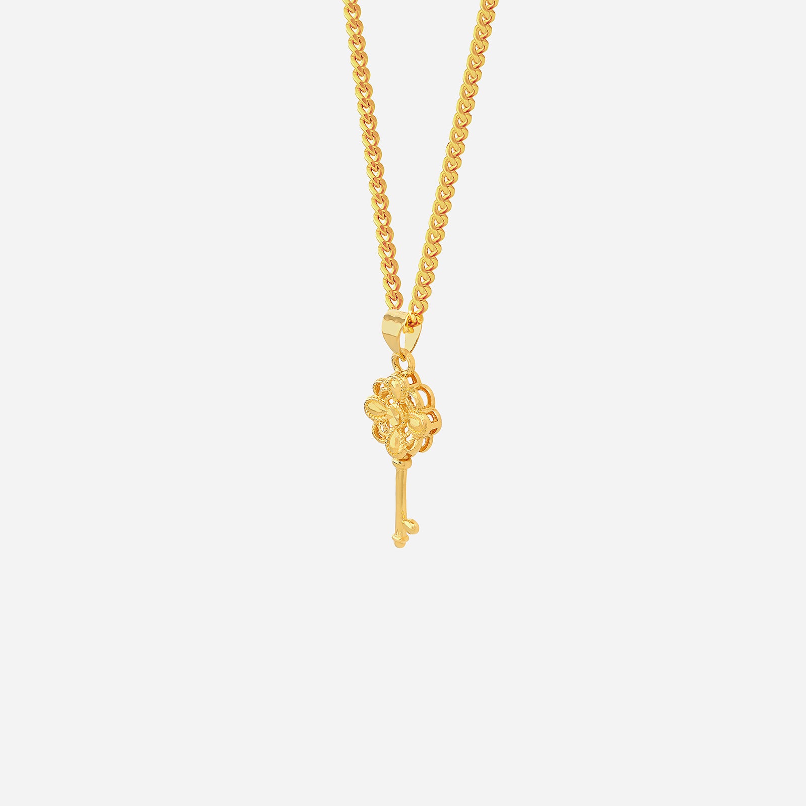 Petal Key Pendant in 24K Yellow Gold with a floral design, celebrating beauty and renewal. Chain not included.