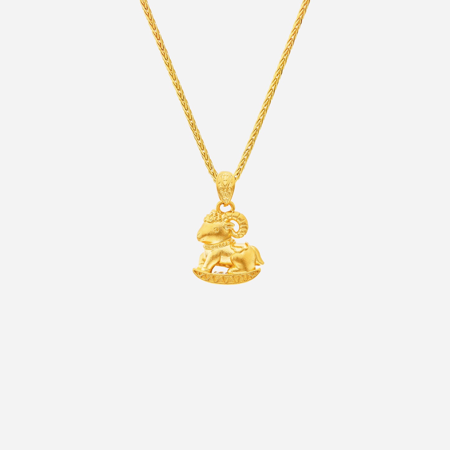 prosper goat pendant in 24k yellow gold with intricate goat design, symbolizing fortune and tranquility. chain not included.