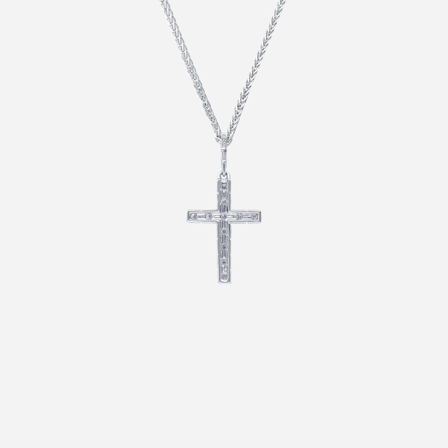 cross pendant in 18k white gold with brilliant diamonds, featuring a sleek, contemporary design.