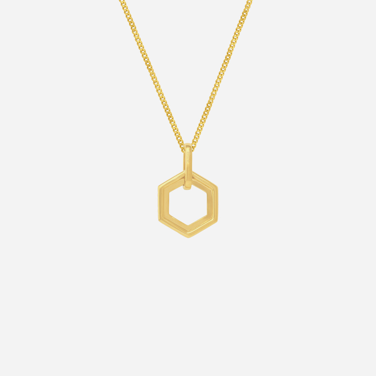 Hexagonal pendant in 18K yellow gold with a modern design, suspended on a delicate gold chain.
