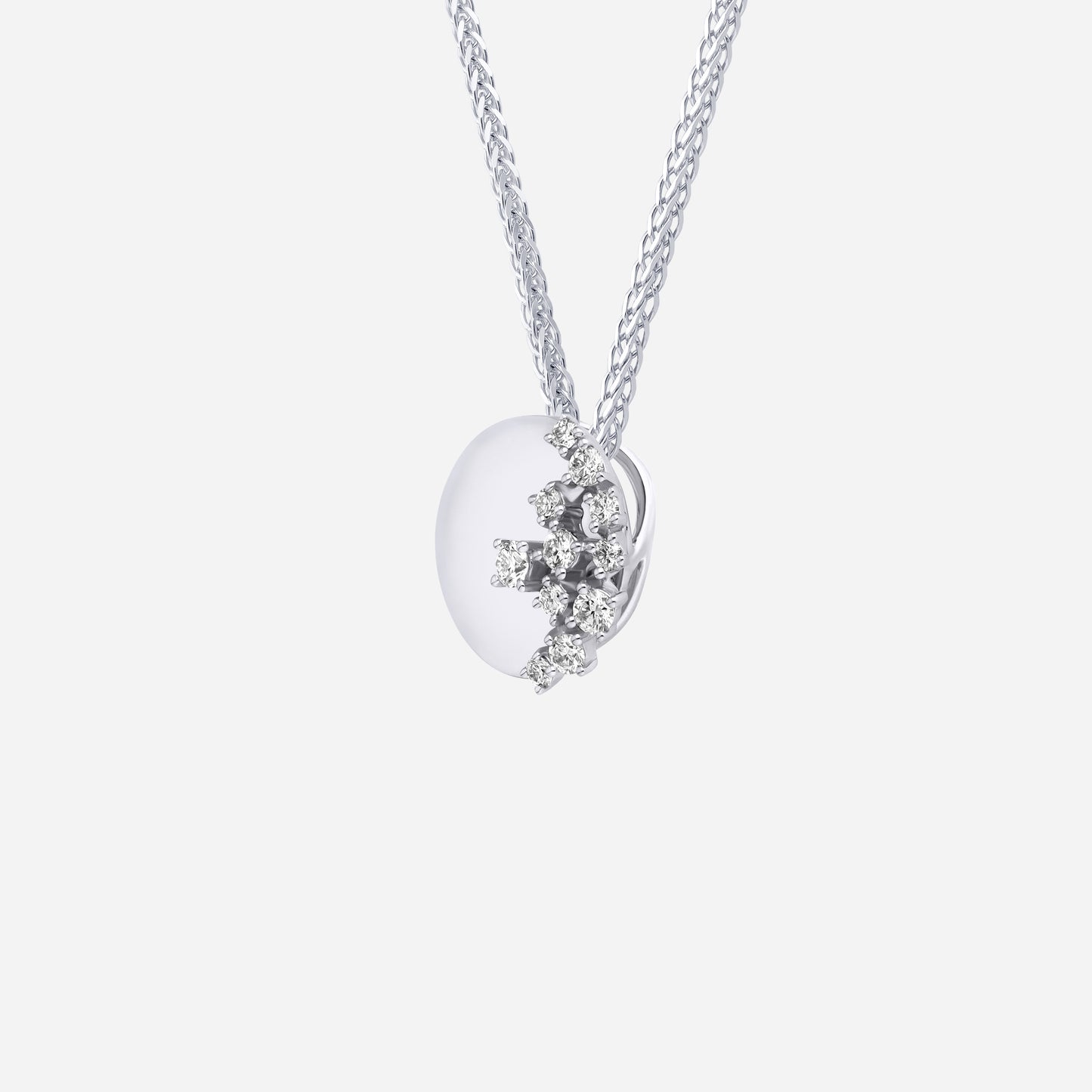 aurora cluster diamond pendant in 18k white gold with an asymmetric cluster of brilliant diamonds.