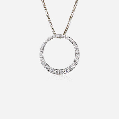 Halo diamond pendant in 18K white gold, featuring a circular design adorned with sparkling diamonds.
