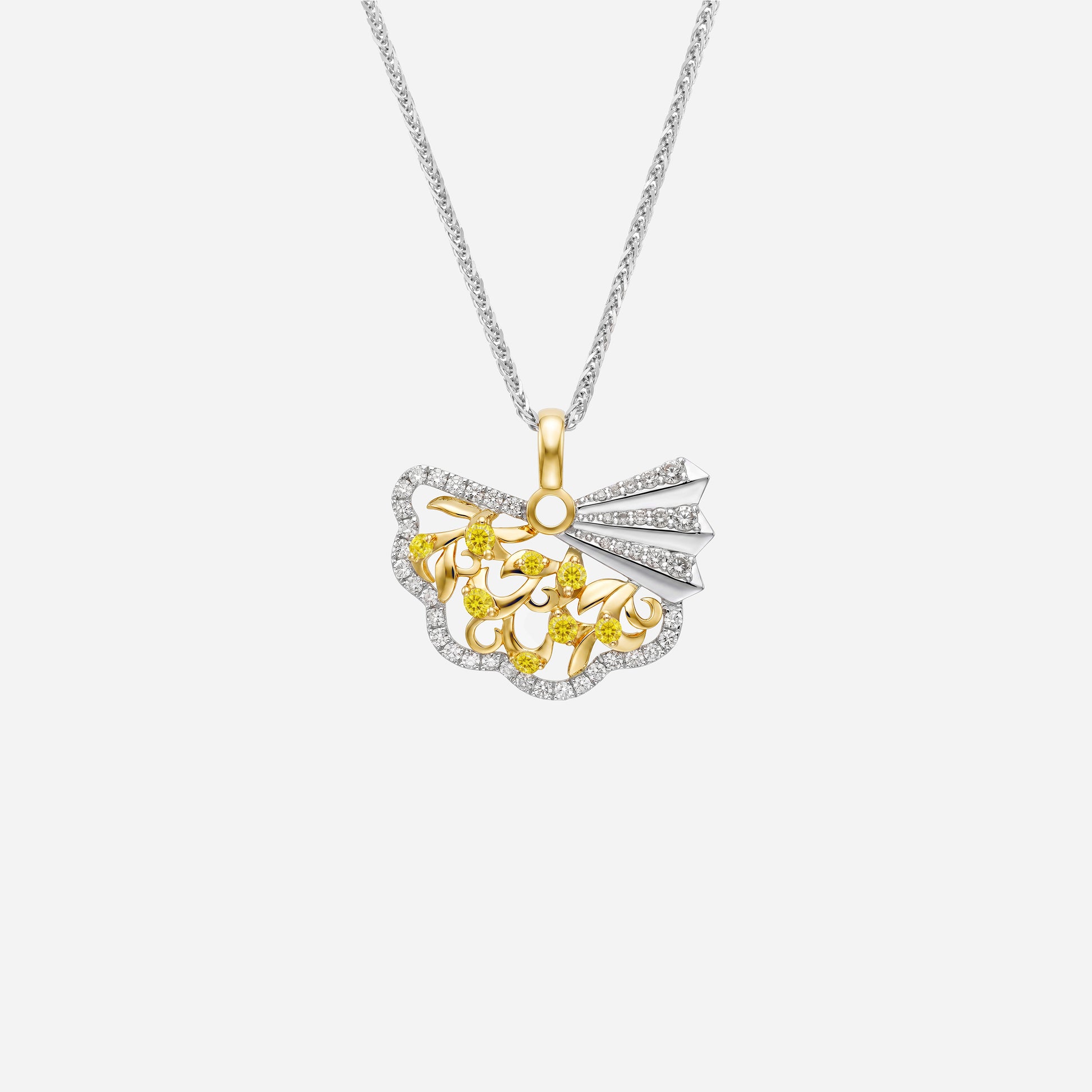 Yellow and white gold pendant featuring ornate fan design with yellow sapphires and diamond accents.
