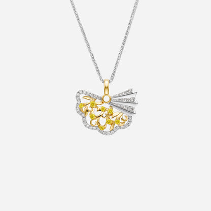 Yellow and white gold pendant featuring ornate fan design with yellow sapphires and diamond accents.