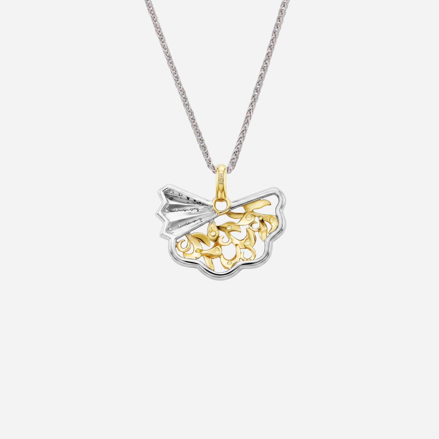 legacy pendant in yellow and white gold, featuring ornate fan design with diamond accents and yellow sapphire details.