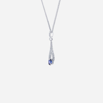 Blue sapphire pendant in 18K white gold with diamond pavé detailing in an elegant teardrop design.