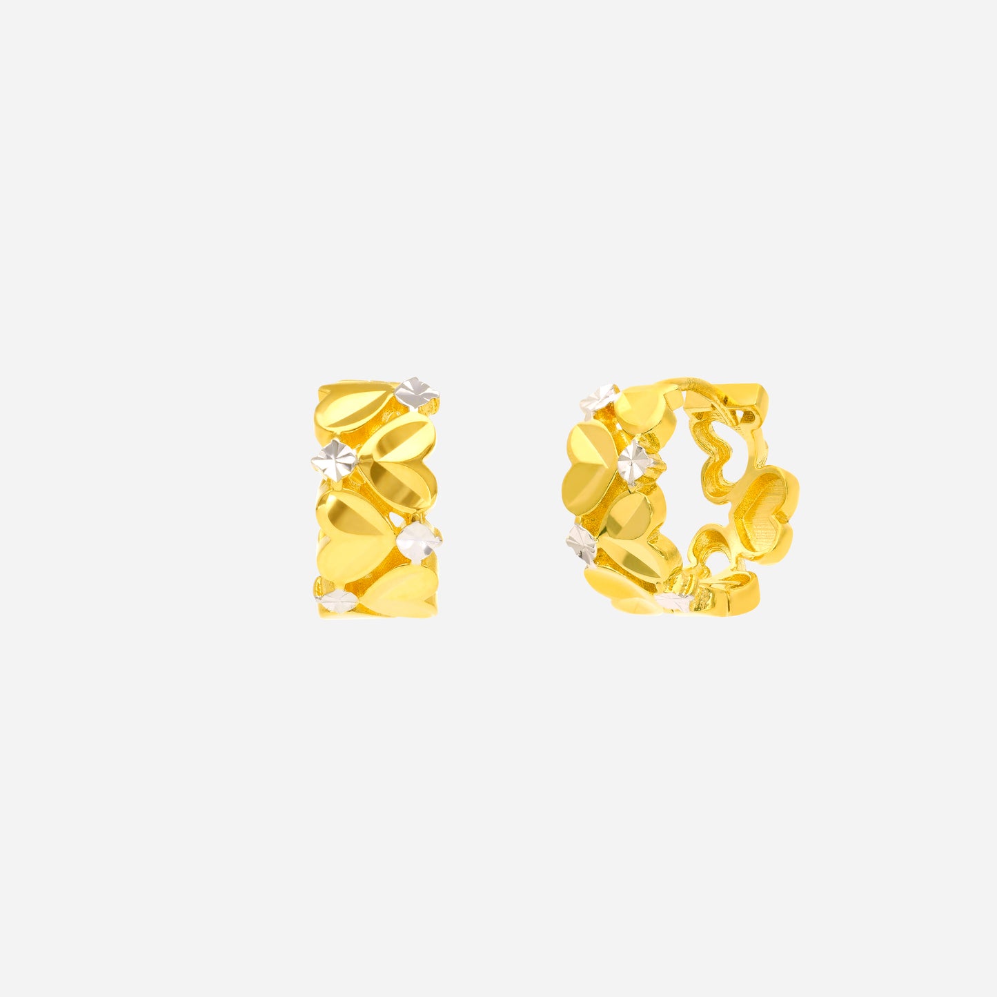 braided twist hoop earrings in yellow and white gold with heart motifs and white gold accents.