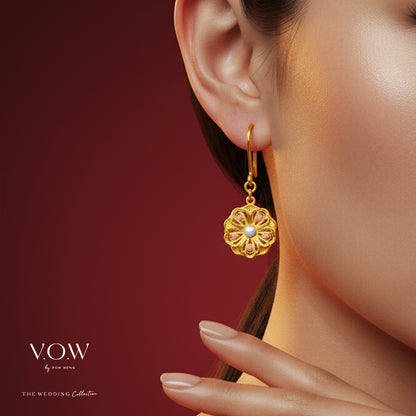 Radiant Blossom Earrings in 24K Yellow Gold with colorful enamel petals and a soft pearl center.