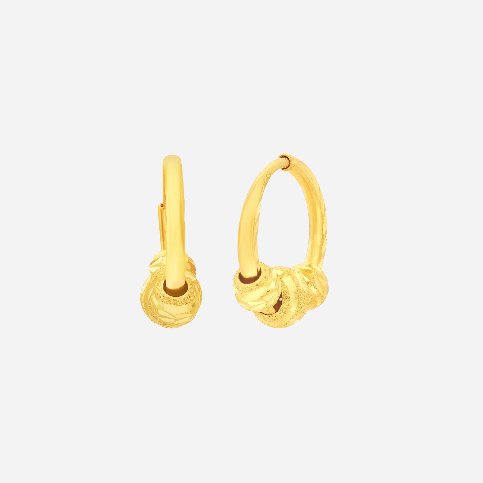 Trio bead hoop earrings in 24K yellow gold featuring three faceted beads on polished hoops.