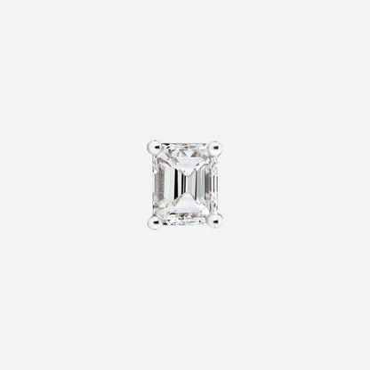 Emerald cut diamond stud earring in 18K white gold with a sleek and elegant design. Perfect for layering or solo wear.