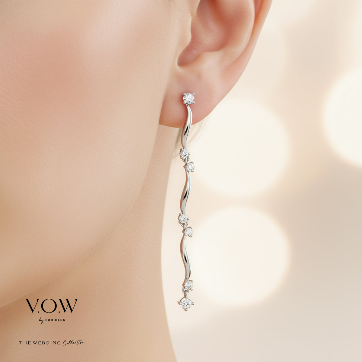 caressing waves diamond earrings in 18k white gold with curved strands and sparkling diamonds catching the light.