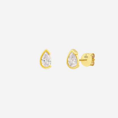 Light Embrace Pear Diamond Earrings in 18K yellow gold with pear-cut diamonds in sleek bezel design.