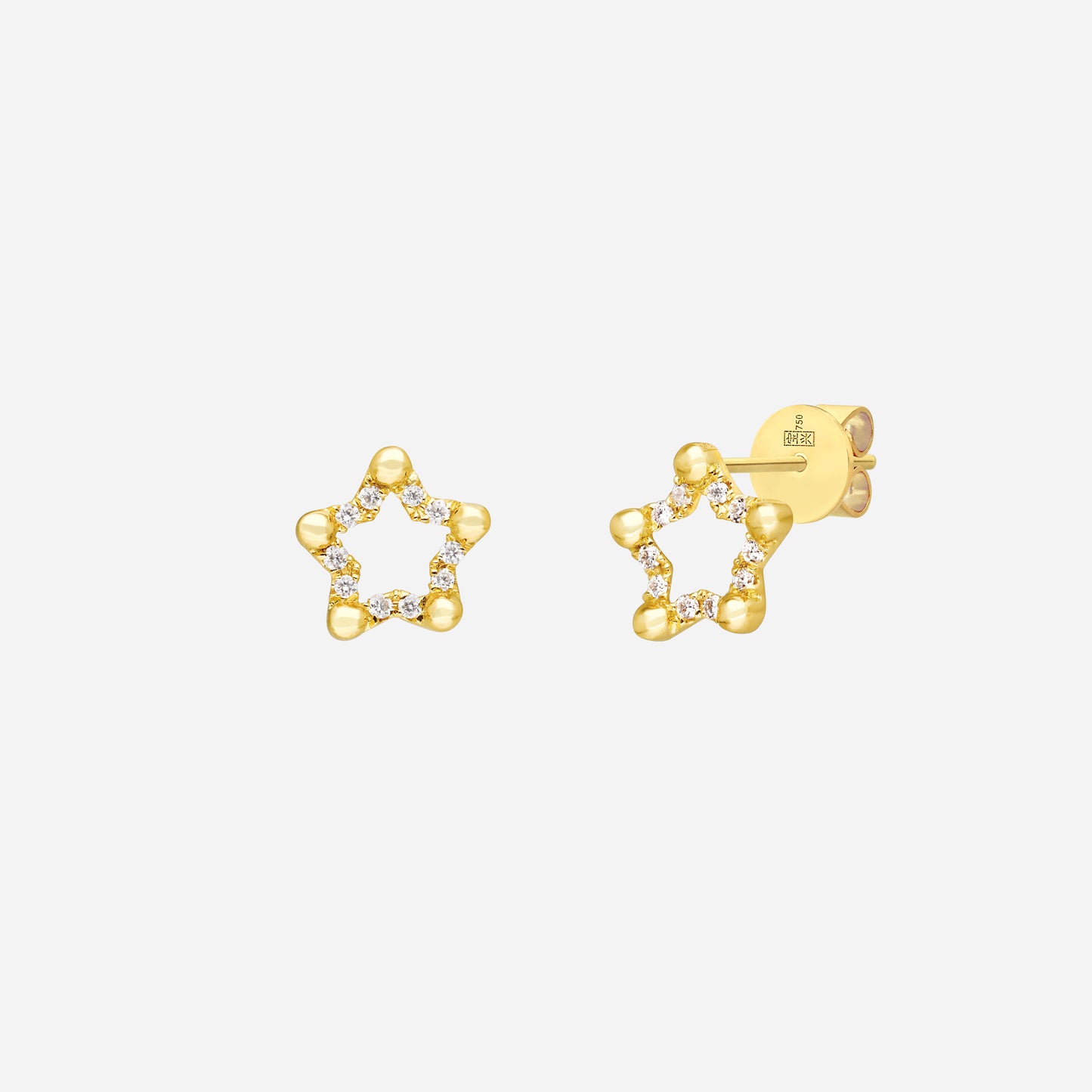 twinkling star-shaped earrings in 18k yellow gold with petite diamonds, playful and elegant design.