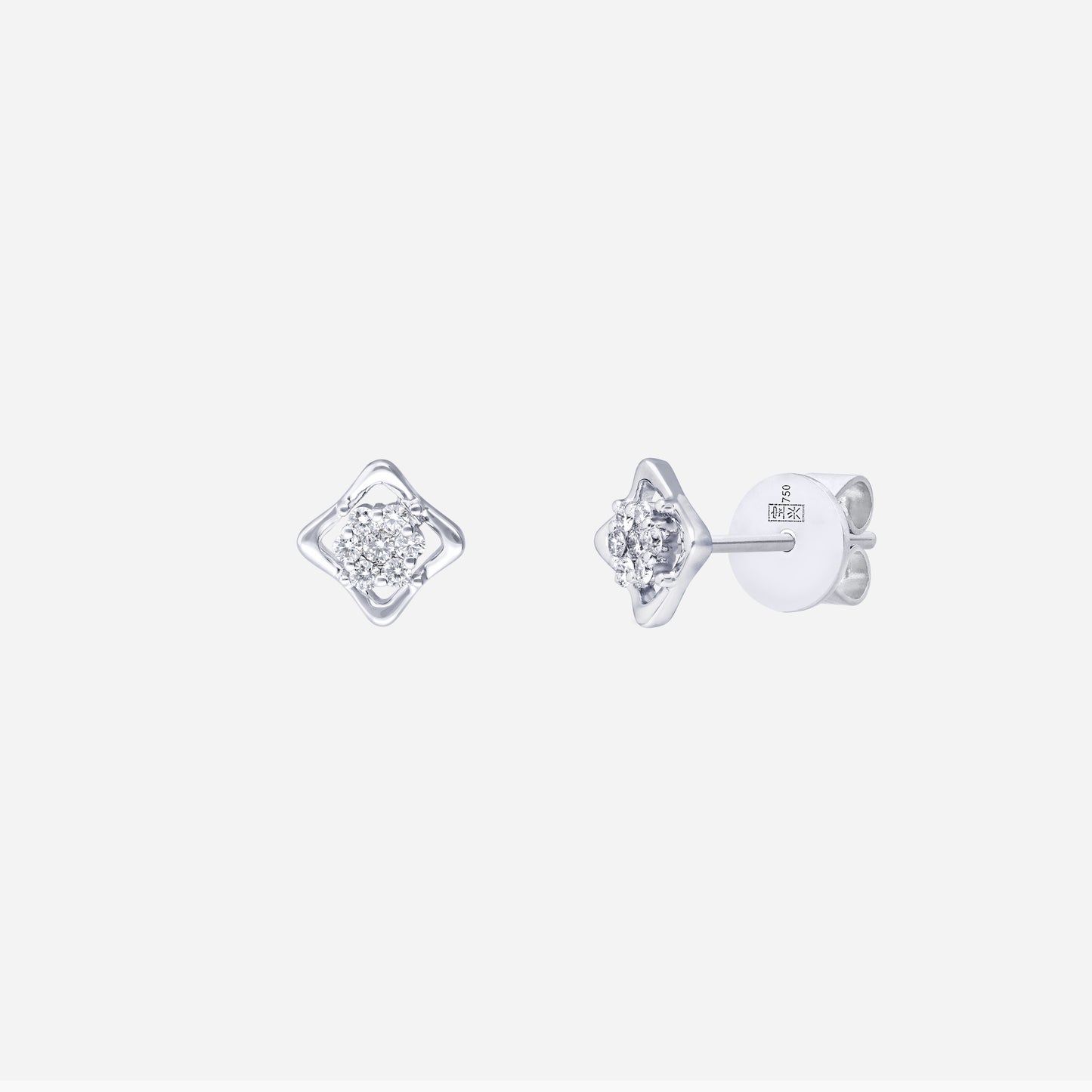 light blossom diamond earrings in 18k white gold with a diamond cluster and airy modern design.