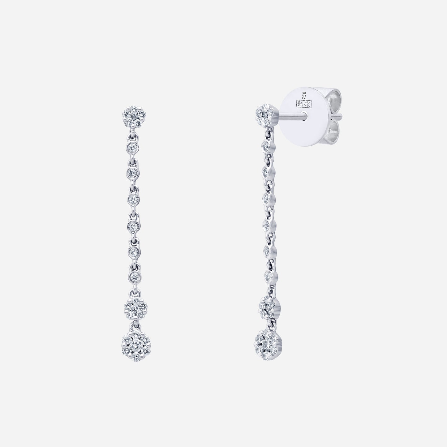 chandelier diamond earrings in 18k white gold with cascading clusters and floral-inspired design.