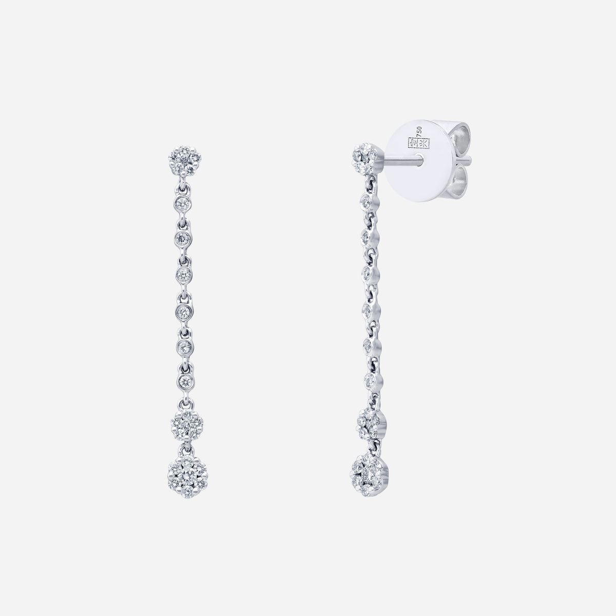 chandelier earrings in 18k white gold with diamond clusters showcasing a floral design and cascading elegance.