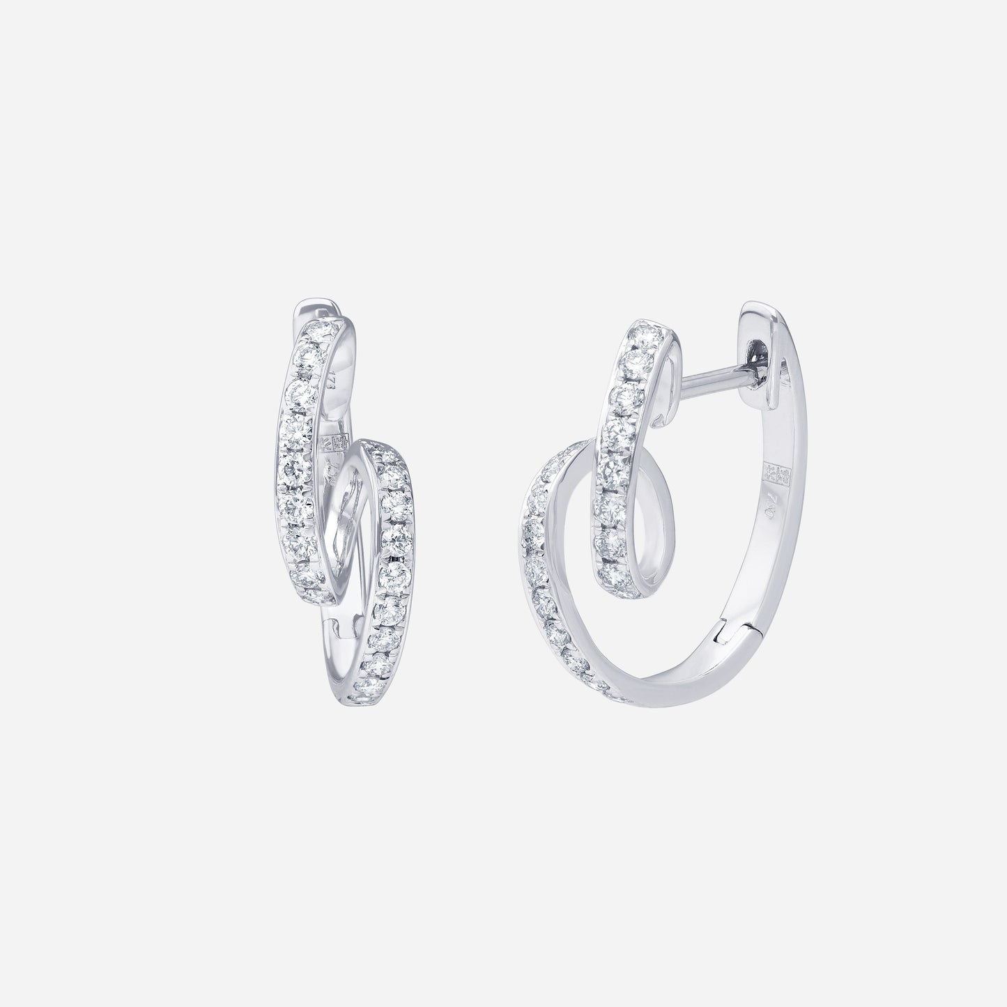 dazzle curl diamond earrings in 18k white gold with pavé-set diamonds and a sculptural, curling design.