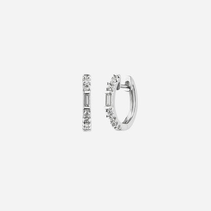 Baguette diamond huggie earrings in 18K white gold with round diamond accents for a chic and elegant look.