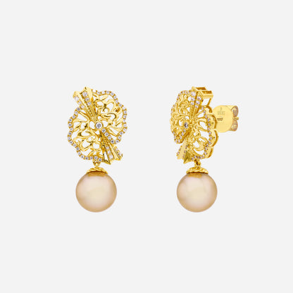 Legacy yellow gold earrings featuring 9–10mm South Sea pearls and diamond accents in intricate origami fan design.