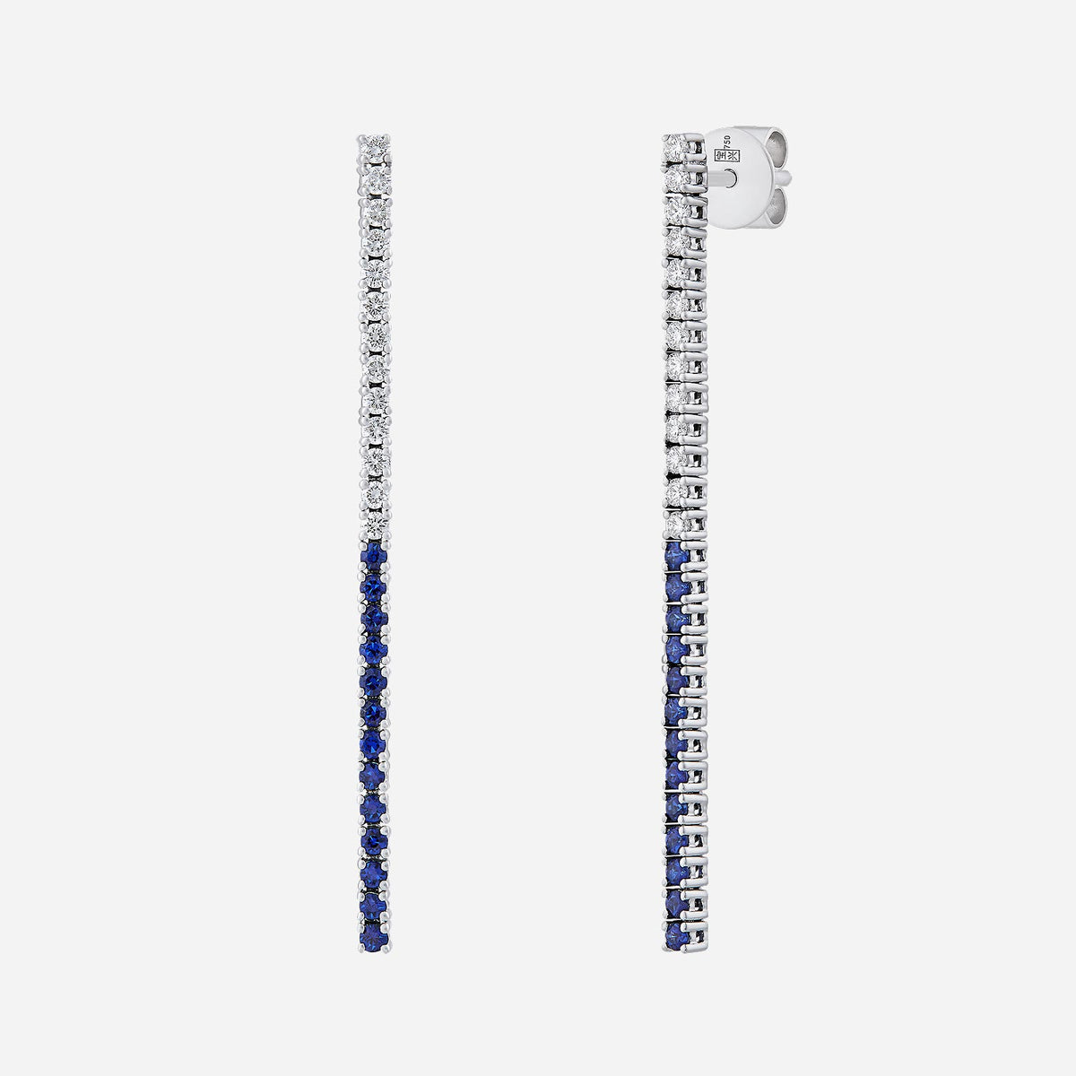 Blue sapphire and diamond earrings in 18K white gold with a sleek linear design and vibrant blue stones.
