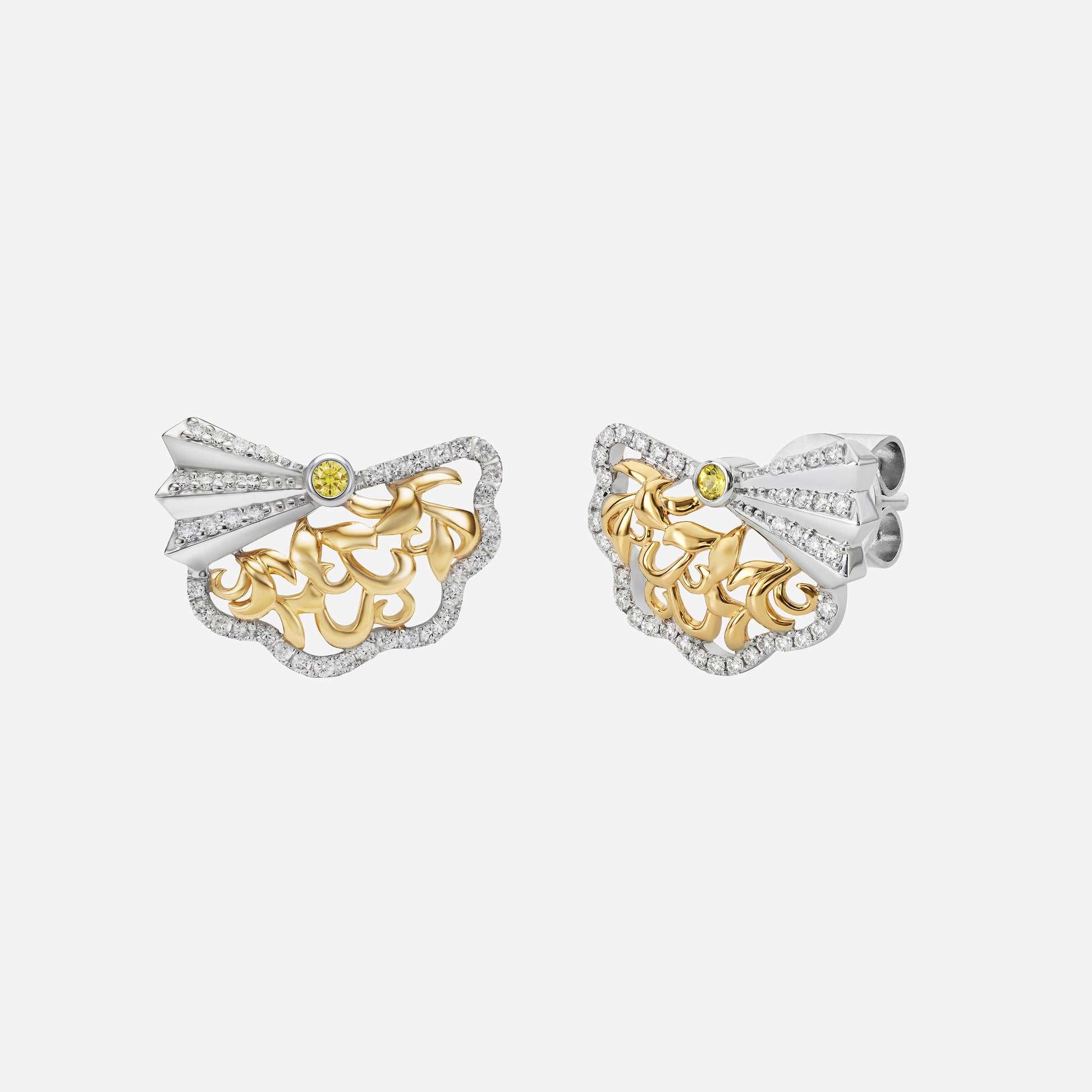 Legacy earrings in yellow and white gold with openwork design, featuring yellow sapphire and diamond accents.