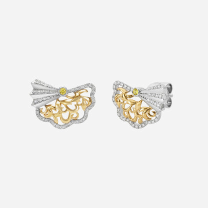 Legacy earrings in yellow and white gold with openwork design, featuring yellow sapphire and diamond accents.